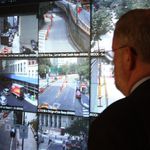 NYPD Deputy Commissioner, Public Information Paul Browne watches the screens of the Domain Awareness System in Lower Manhattan